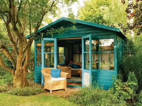 Friends sitting outside the shed